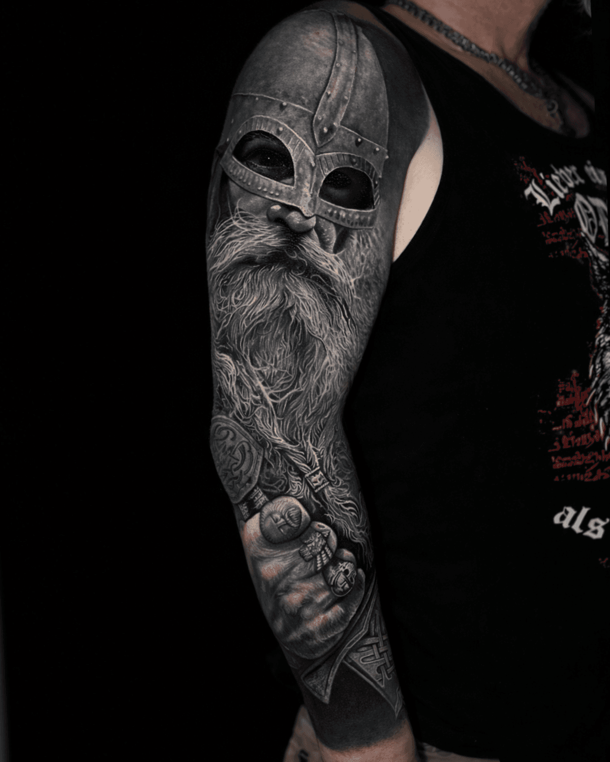 Black and grey portrait cover-up tattoo transformation in Berlin.